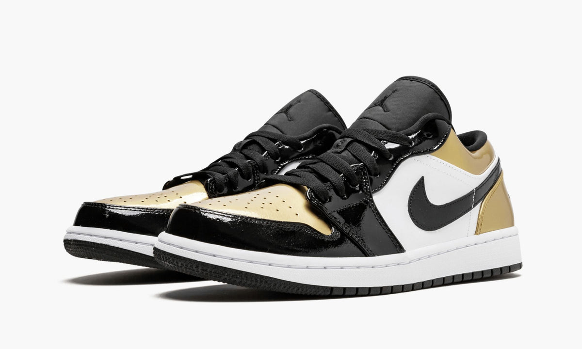 Air Jordan 1 Low Gold Toe Sneakers