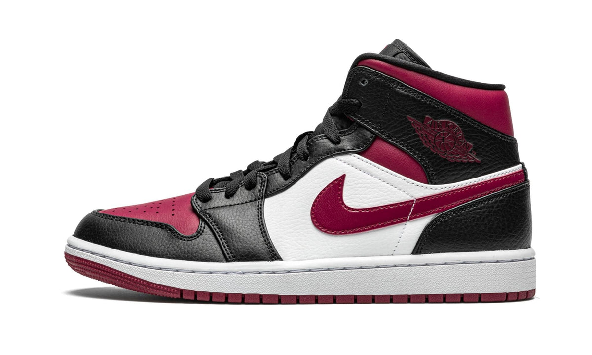 Air Jordan 1 Mid Bred Toe Sneakers