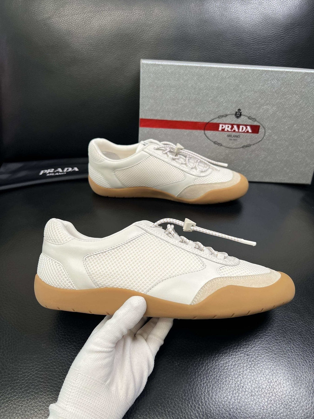 Prada White Gum Sole Low-Top Sneakers — model