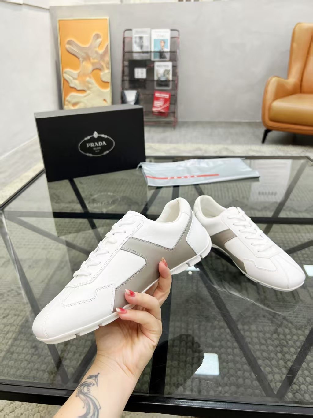 Prada White and Taupe Low-Top Sneakers — model