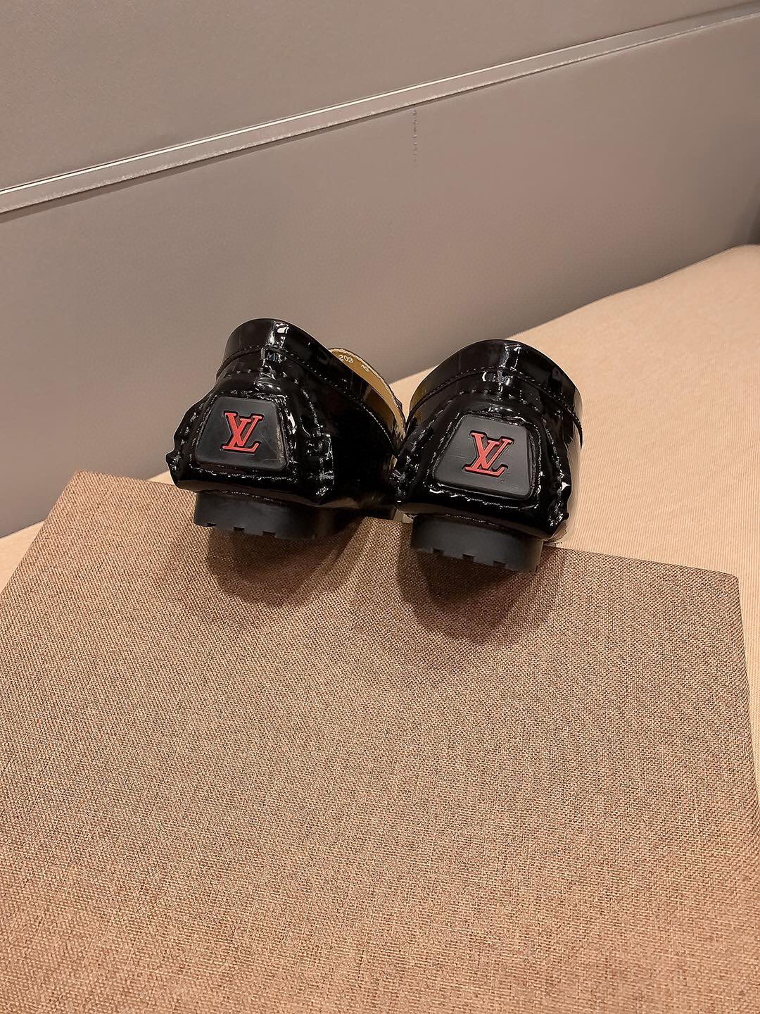 Louis Vuitton Black Embossed Loafers — back