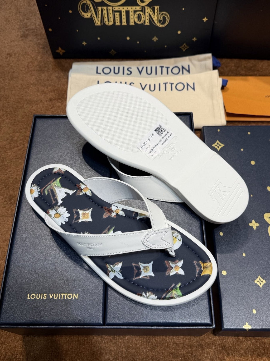 Louis Vuitton White & Navy Floral Flip-Flops — model