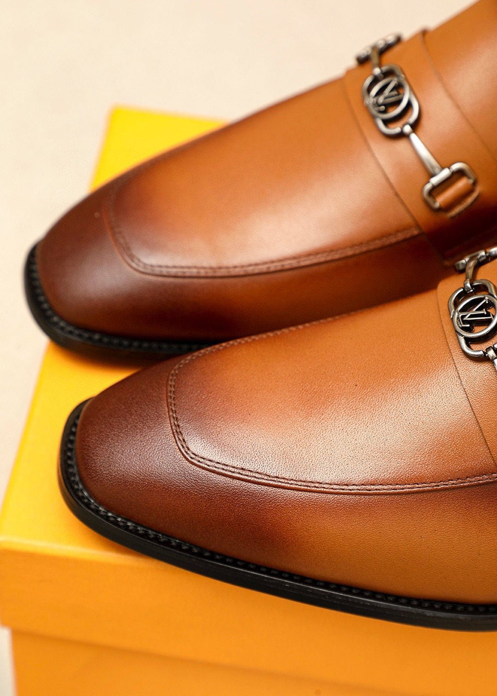Louis Vuitton Metal-Bit Leather Loafers — detail