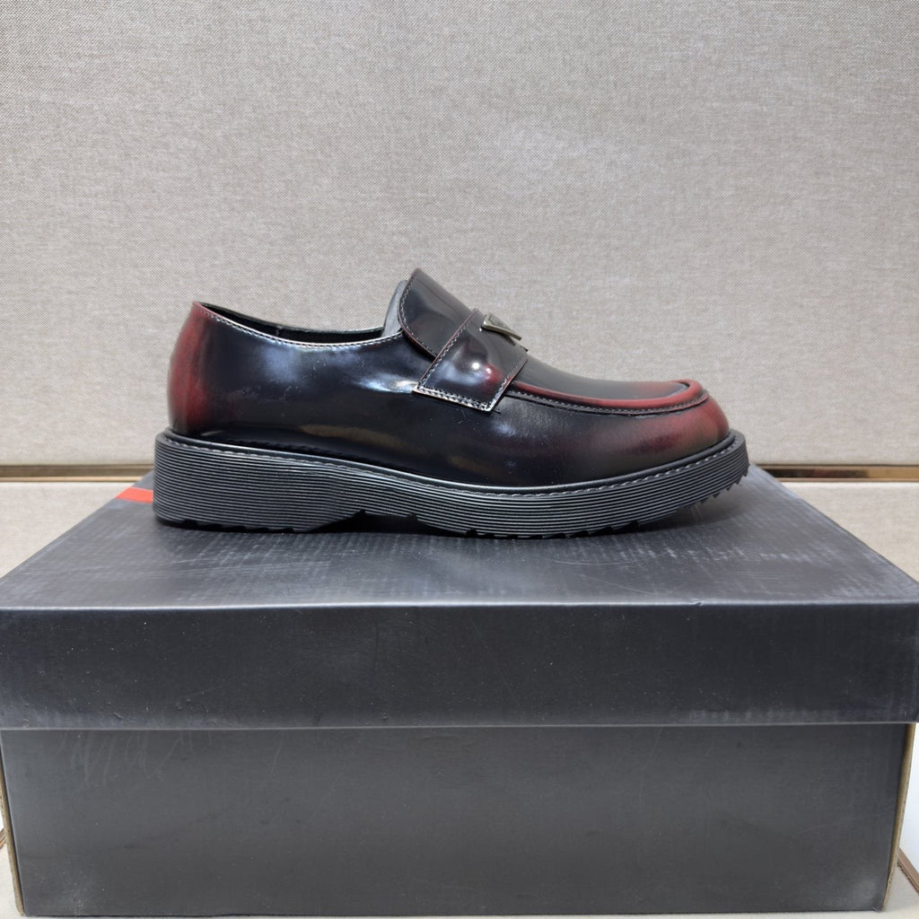 Prada Black Lug Sole Slip-On Shoes — side