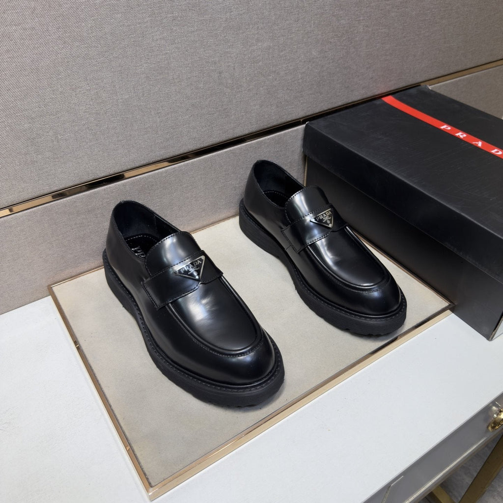 Prada Black Lug Sole Slip-On Shoes — hero